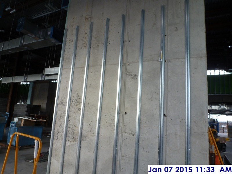 Metal furring the Elev. 1,2,3 shear walls at the 4th floor Facing North